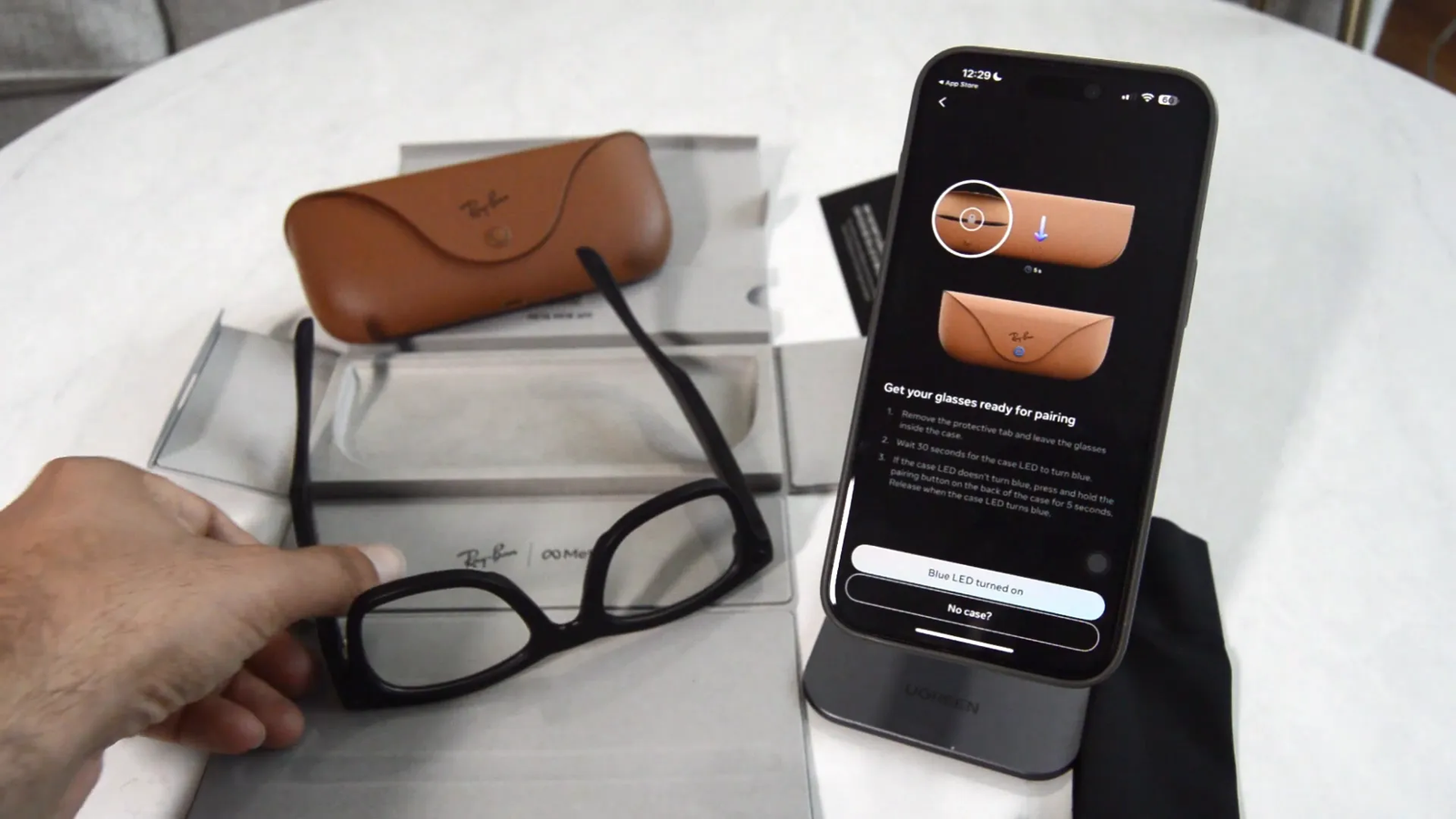 Removing protective tab and placing glasses back in case