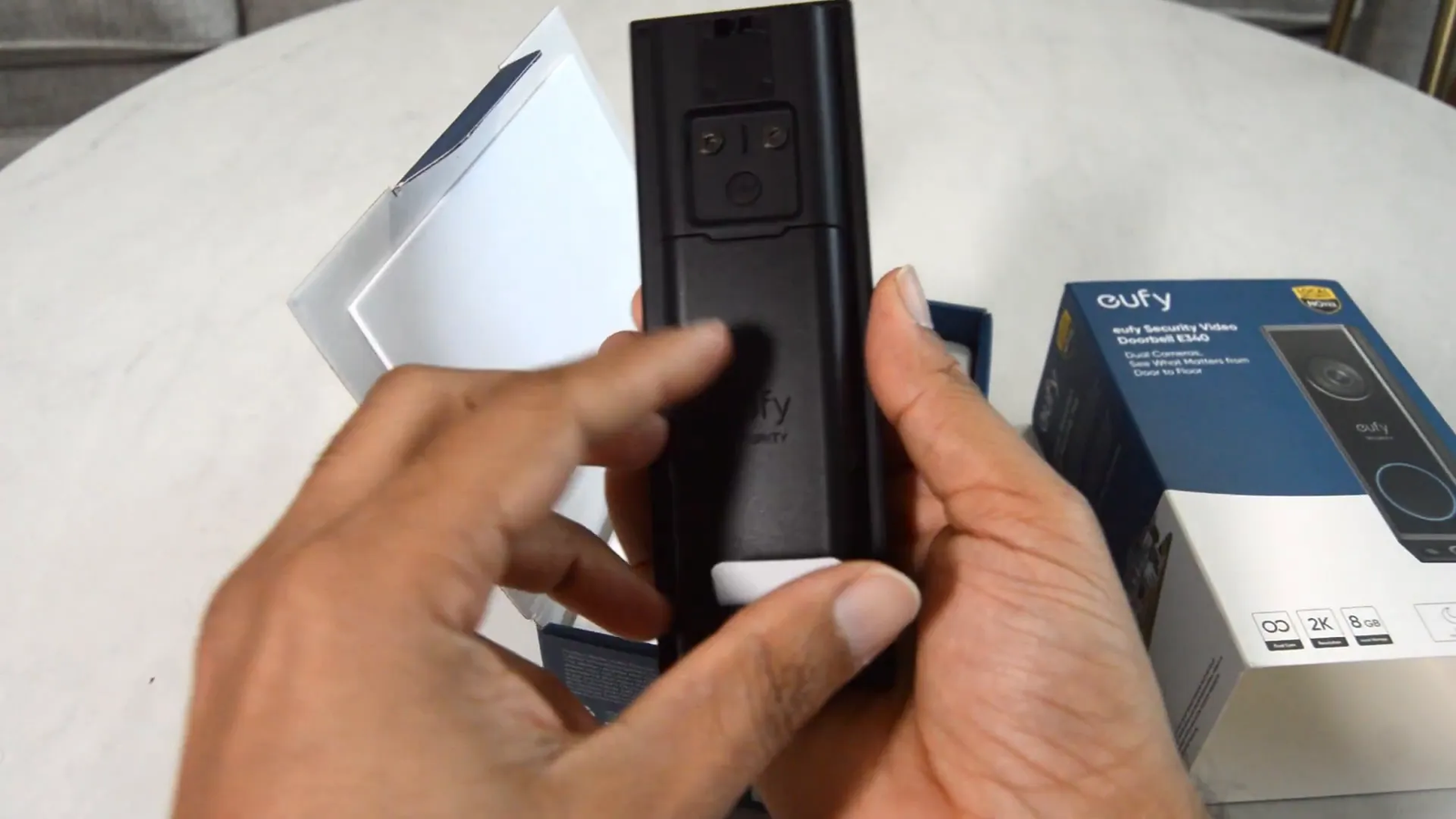 Eufy e340 doorbell with battery removed for charging