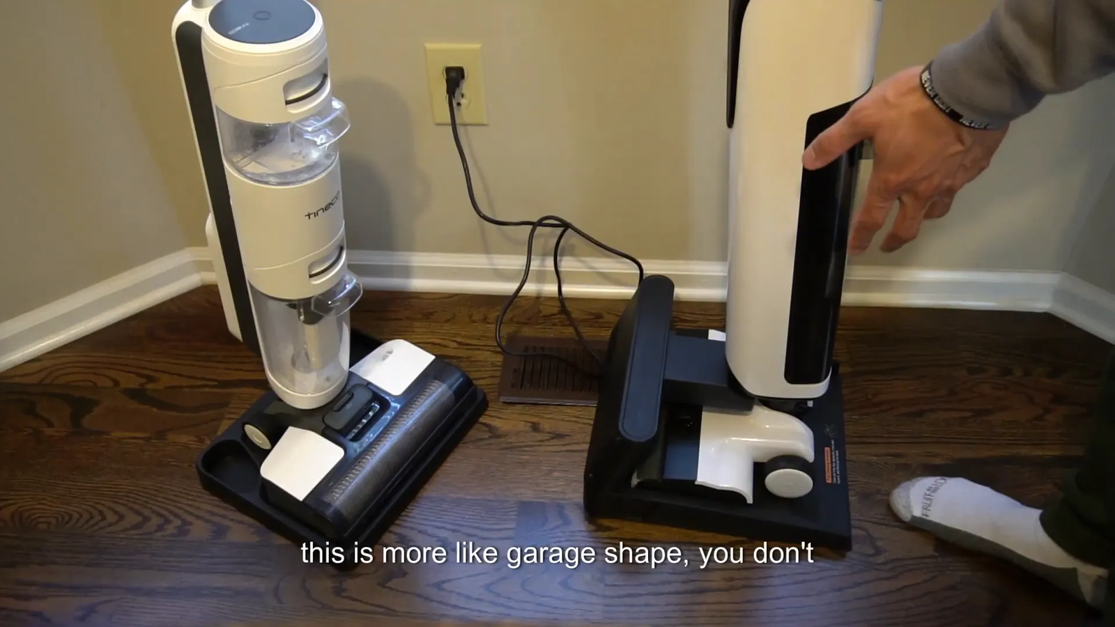 UWANT and Tineco mop vacuum cleaners docked for charging