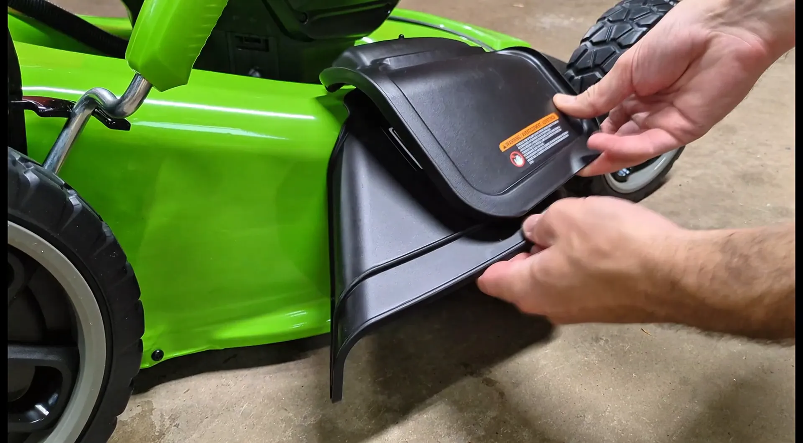 Attaching side discharge chute to mower