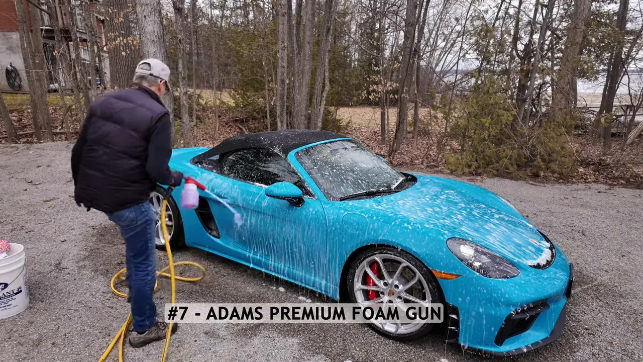 Adam's Polishes Premium Foam Gun producing thick foam on a car