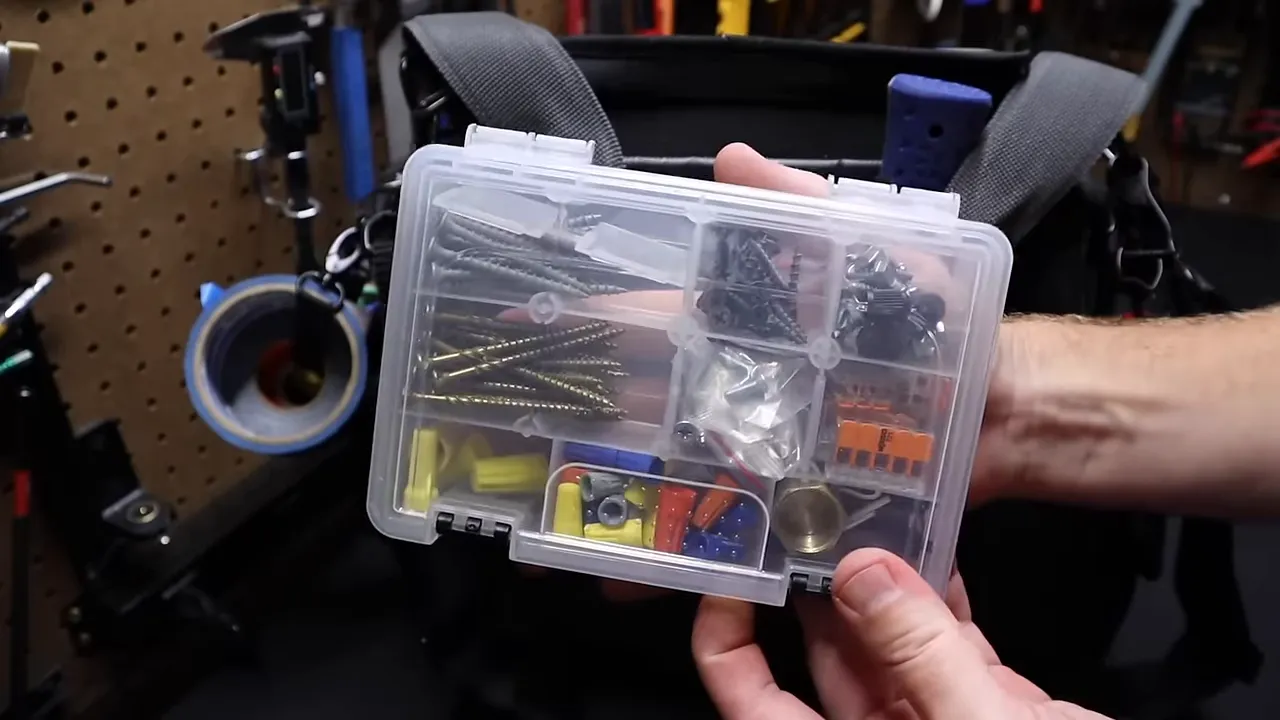 Husky clear parts box inside back pocket with assorted screws and Wagos