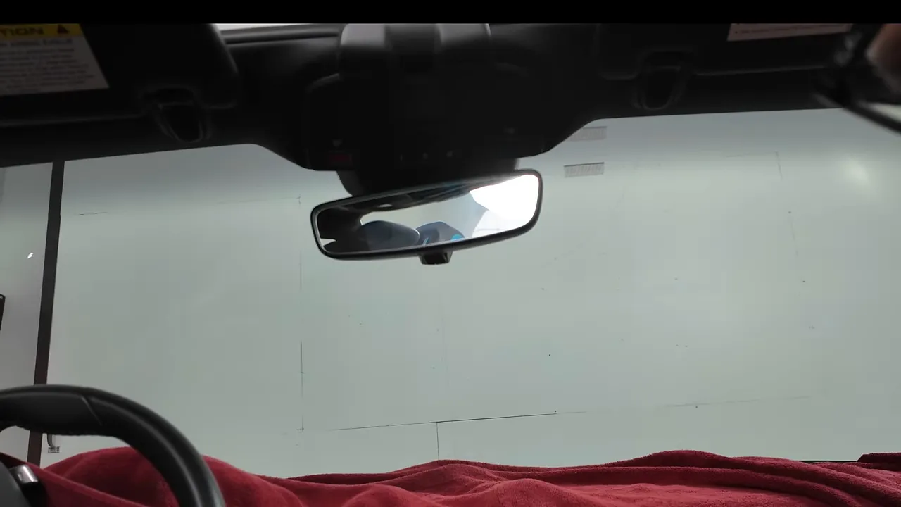 Towel covering dashboard to protect from drips
