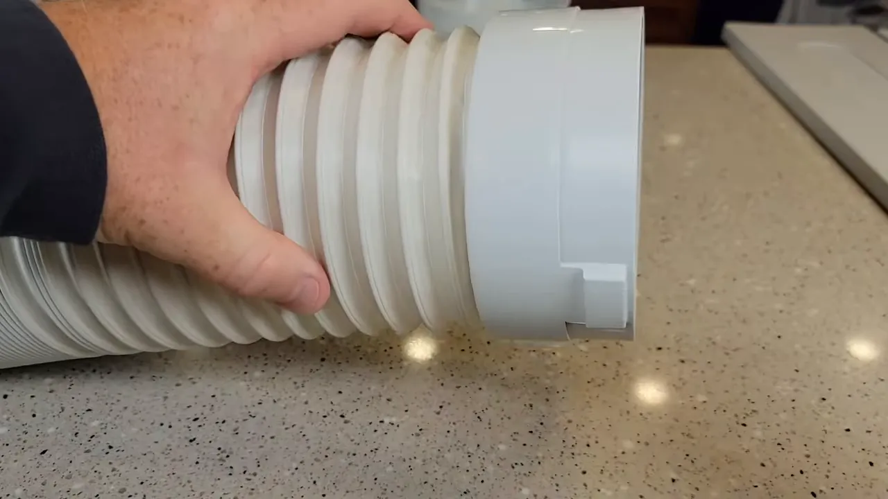 Threaded adapter ready to be screwed onto duct