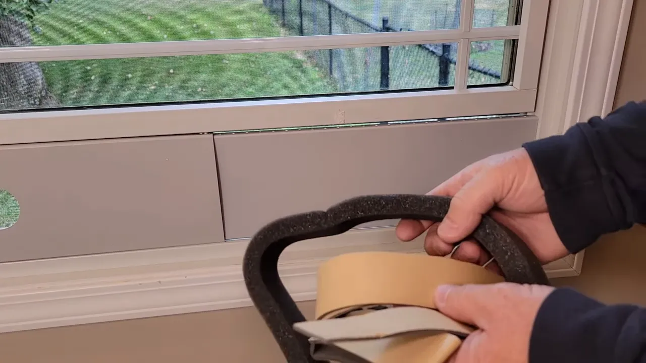 Small adhesive foam pads to seal between panel and window sill
