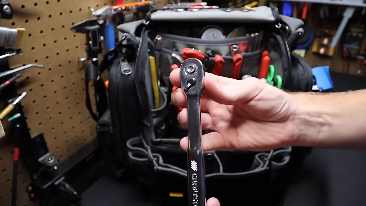 3/8 inch ratchet, extension, and socket tools stored in the bag