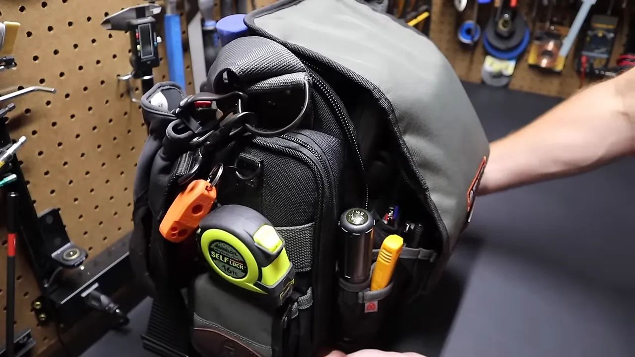 Gloves clipped to Veto D-ring and Carhartt safety glasses