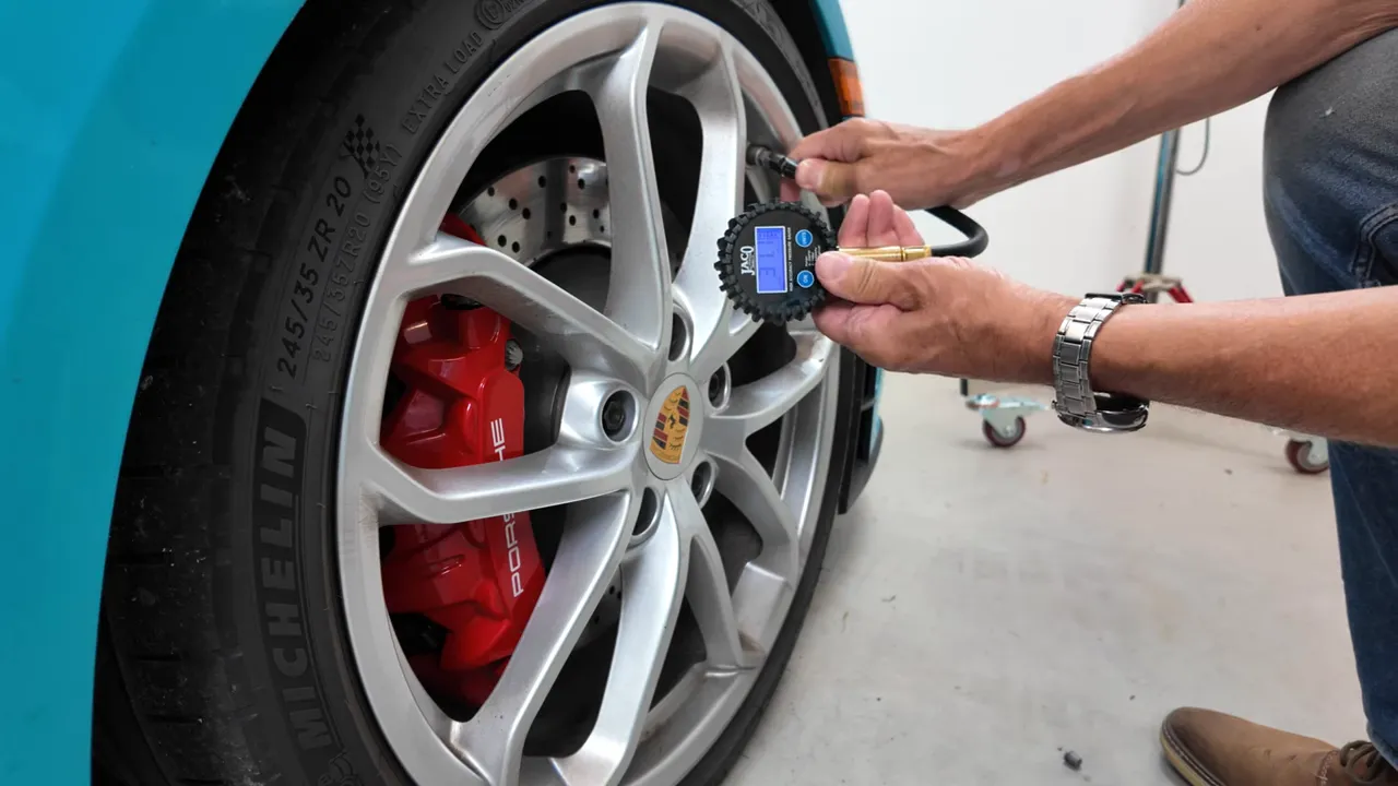 Portable tire inflator connected to tire valve