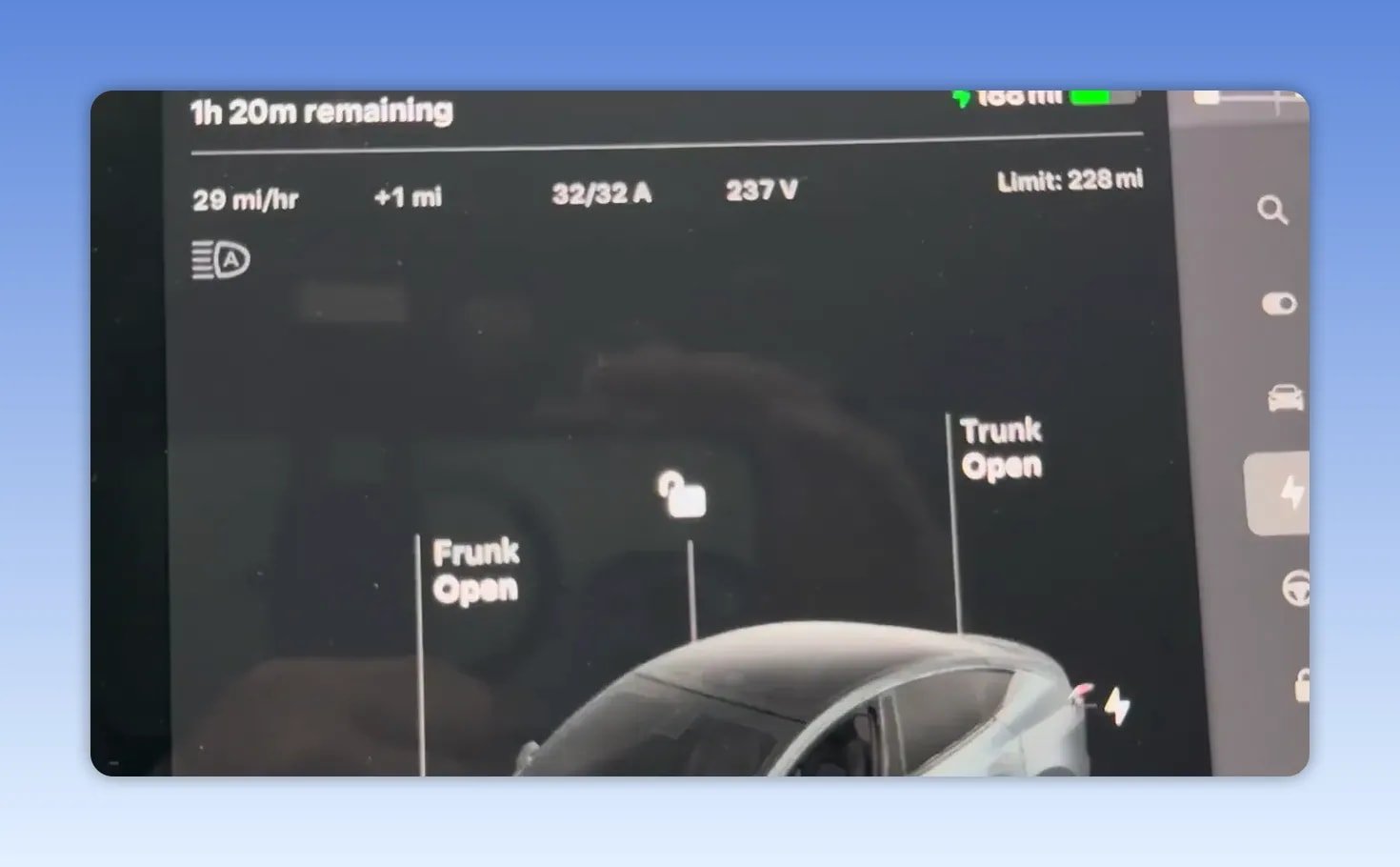 Tesla charging screen showing 32 amps at 237 volts and 29 miles per hour added