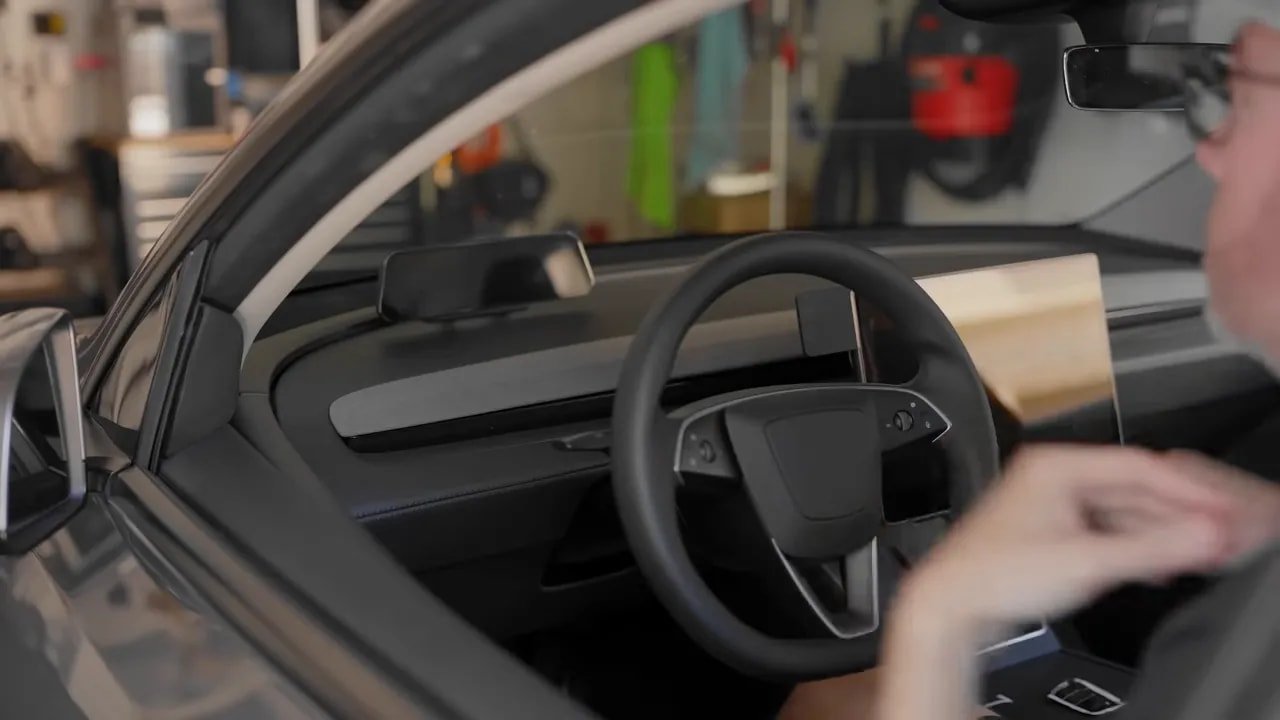 S3XY Dash driver display showing colorful CarPlay app icons above a Tesla dashboard